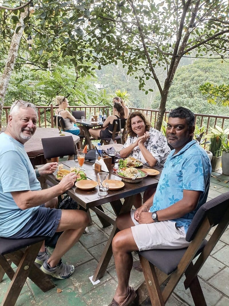 Minoli Lanka Tours guide sharing a relaxed meal with guests